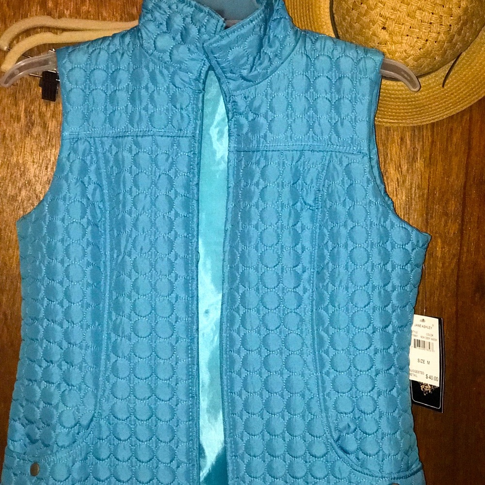 Quilted light colored vest Aqua